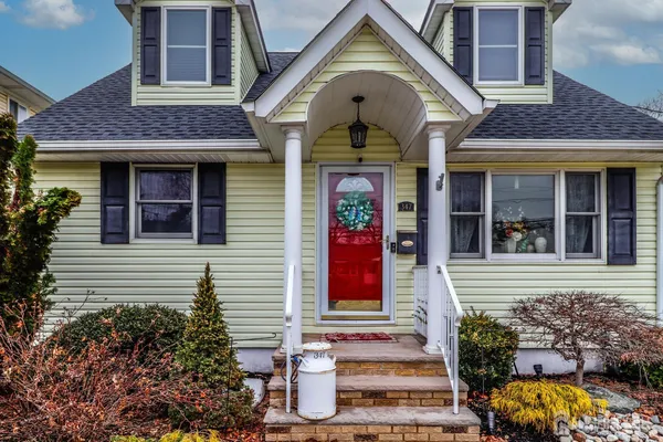 a front view of a house with a porch