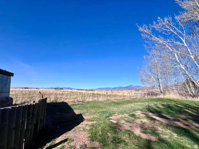 479 East 100 N Road Meadow, UT 84644 - Photo 36 of 59 View of yard featuring a mountain view and a rural view