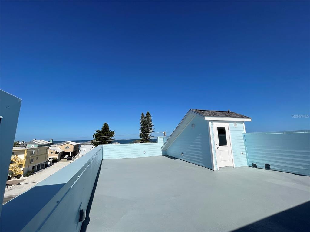711 Gulf Boulevard Indian Rocks Beach, FL 33785 - Photo 14 of 19 a bed room with a bed