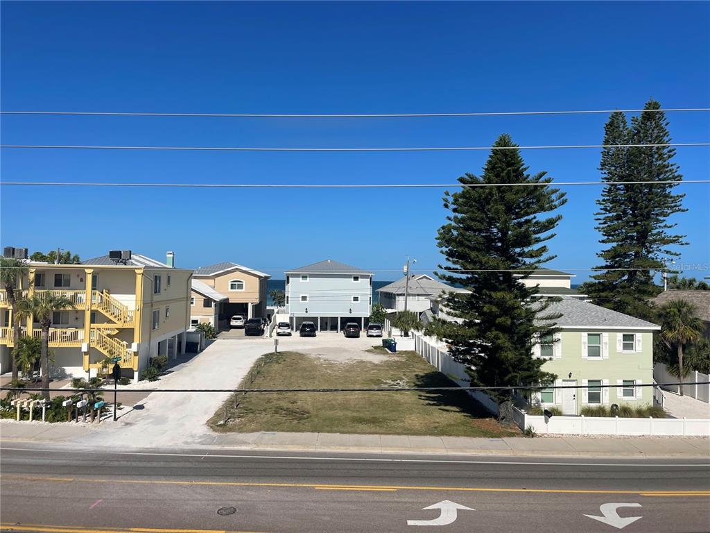 711 Gulf Boulevard Indian Rocks Beach, FL 33785 - Photo 15 of 19 a view of a city street and trees