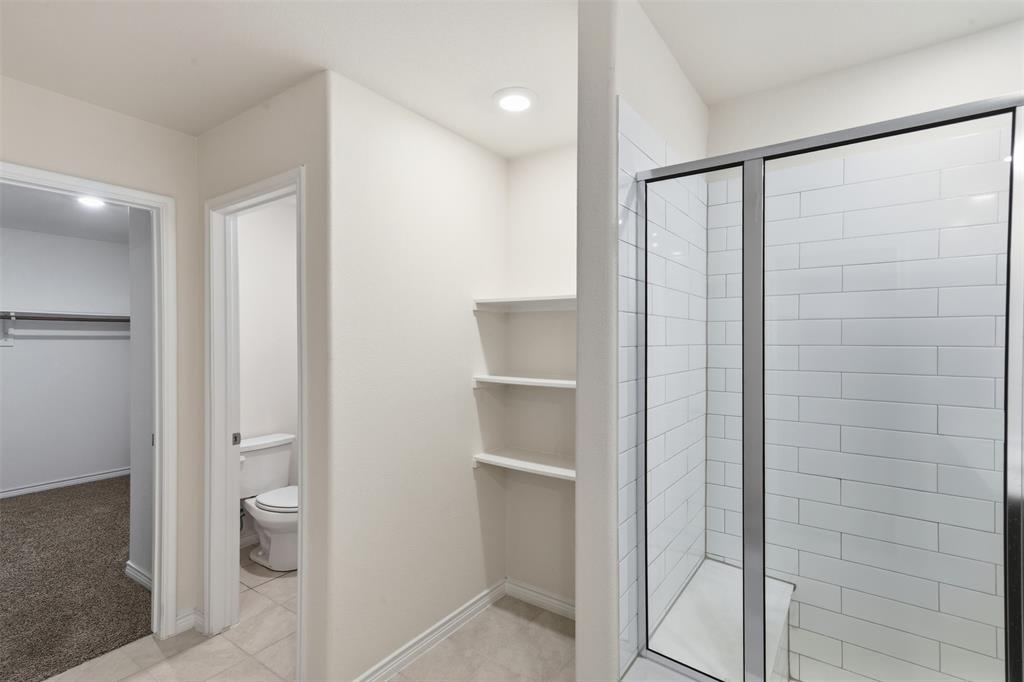 415 Boston Road Fate, TX 75189 - Photo 22 of 40 Primary bath shower