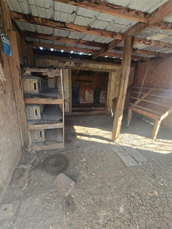 608 Ripley Street Coleman, TX 76834 - Photo 20 of 23 a view of room with a fireplace