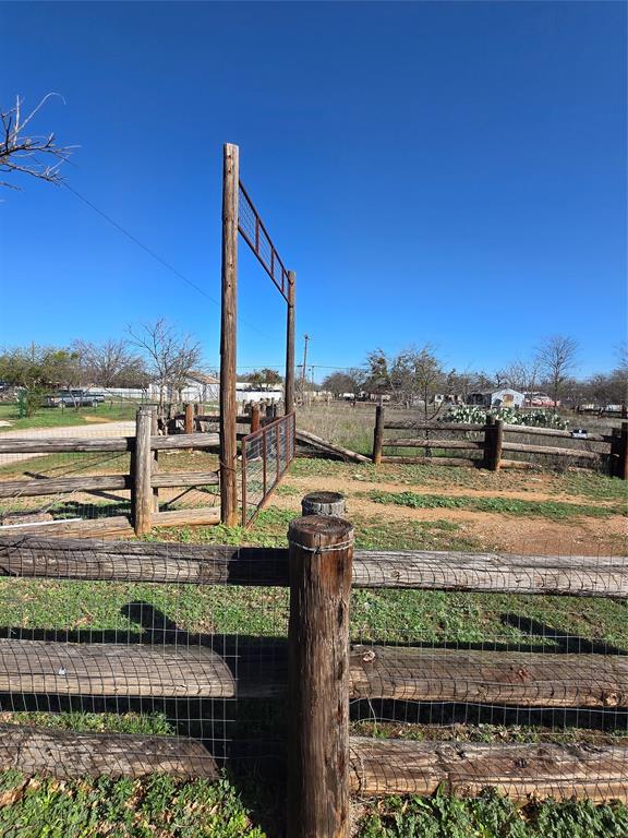 608 Ripley Street Coleman, TX 76834 - Photo 22 of 23 a view of a water with large building in the background