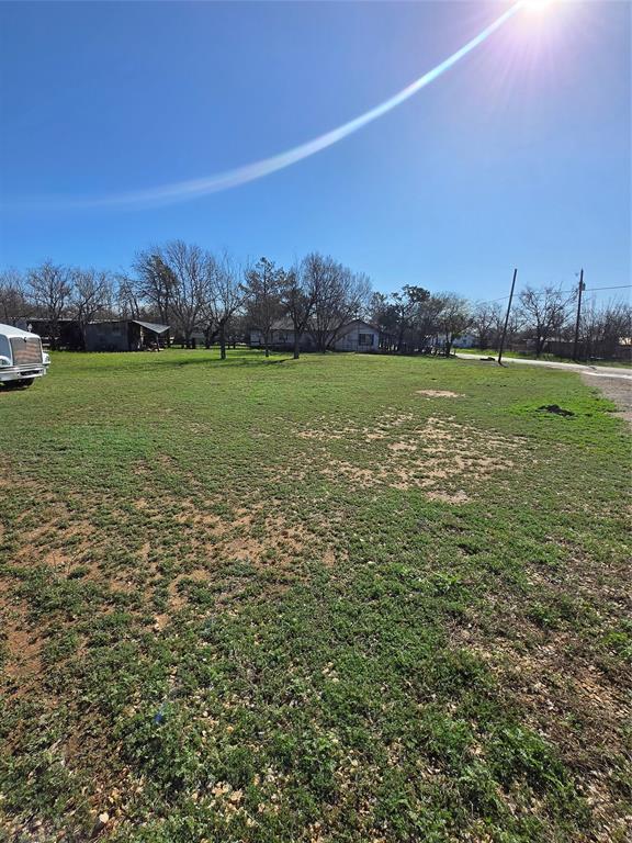 608 Ripley Street Coleman, TX 76834 - Photo 23 of 23 a view of a lake with houses in the background