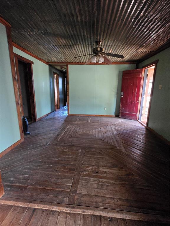 608 Ripley Street Coleman, TX 76834 - Photo 3 of 23 a view of large hall with wooden floor