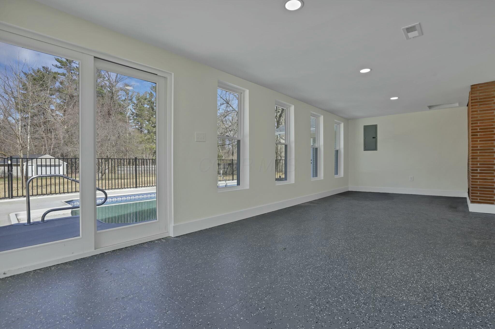 3301 Daglow Road Columbus, OH 43232 - Photo 41 of 60 Four Season Room with 7 windows - opens to the POOL!