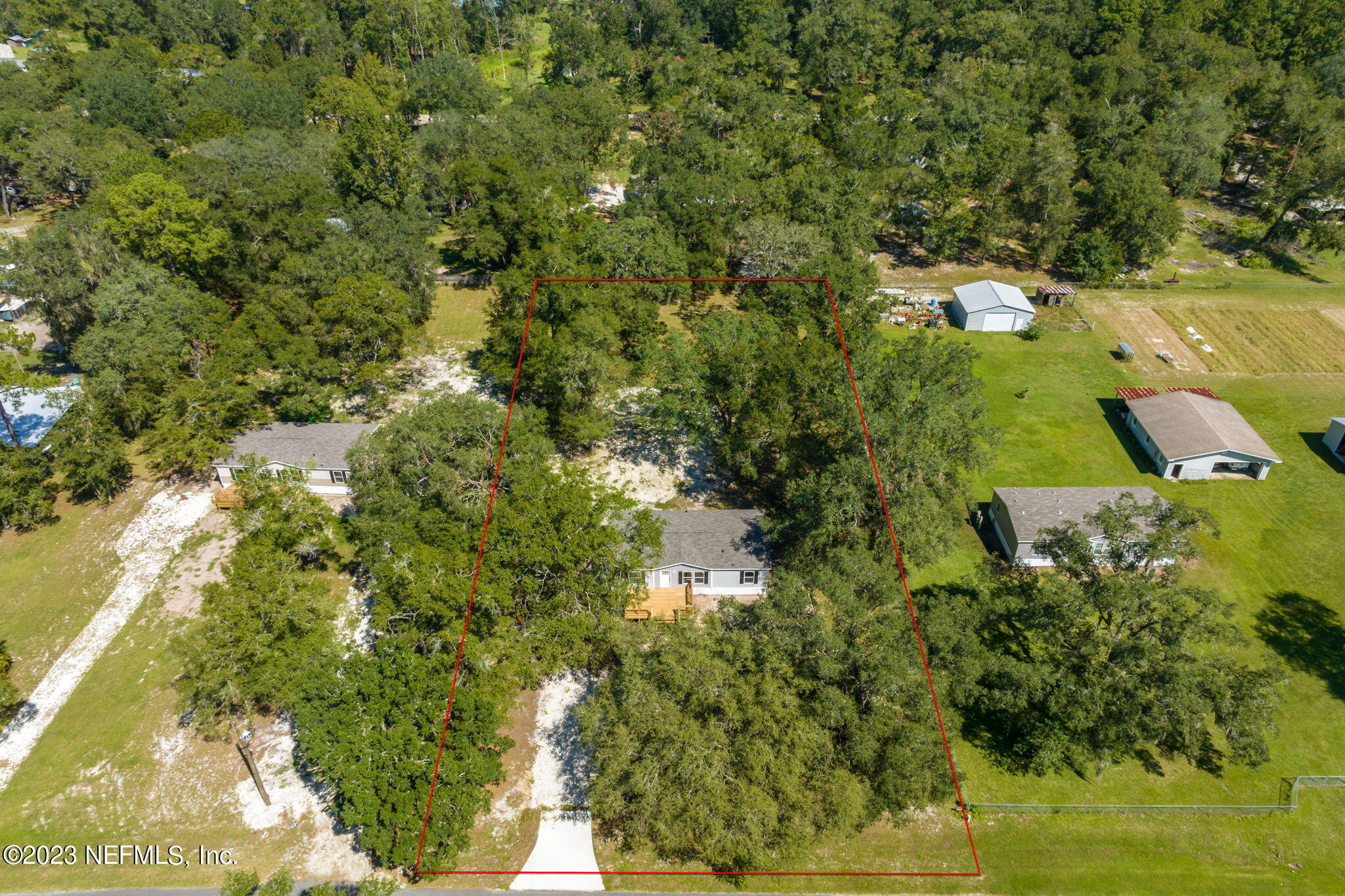 1100 Mulberry Landing Road Hilliard, FL 32046 - Photo 28 of 32 a view of a yard