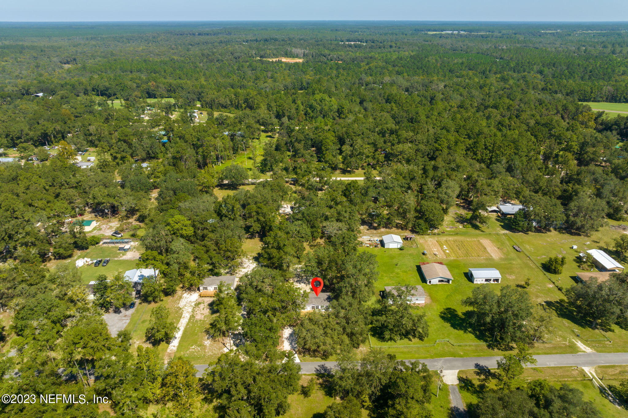 1100 Mulberry Landing Road Hilliard, FL 32046 - Photo 30 of 32 a view of a lush green field