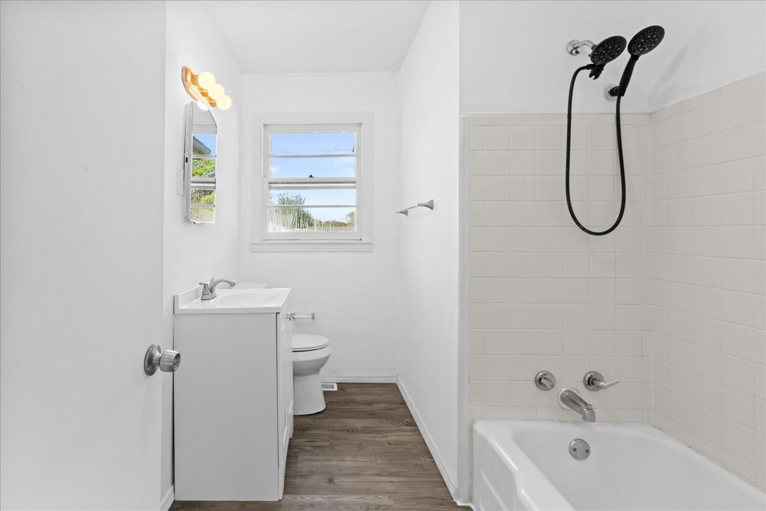 603 3rd Street Lawrenceburg, TN 38464 - Photo 8 of 11 a bathroom with a sink a toilet and shower