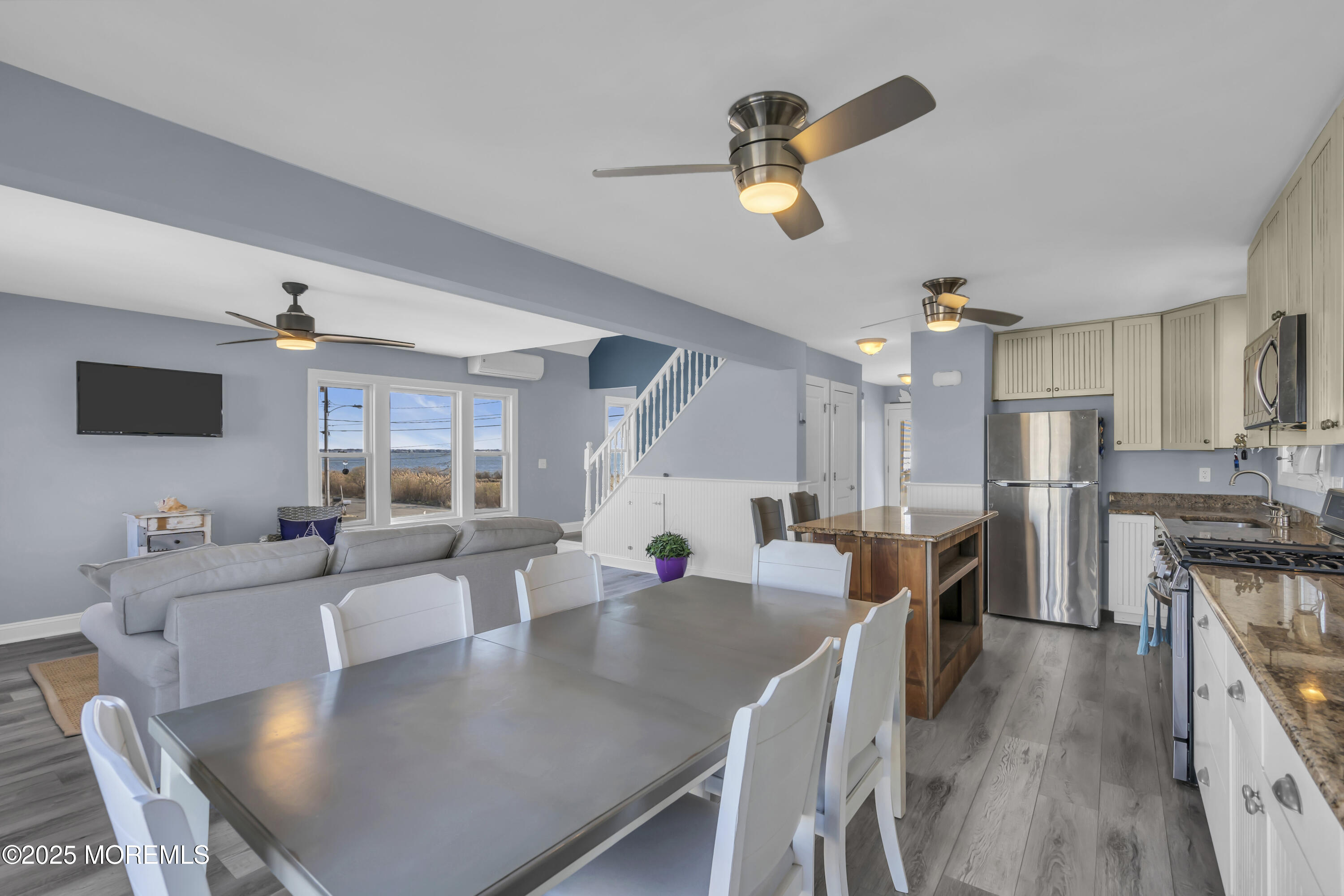 132 St Lawrence Boulevard Brick, NJ 08723 - Photo 11 of 55 a living room with stainless steel appliances furniture and a view of kitchen