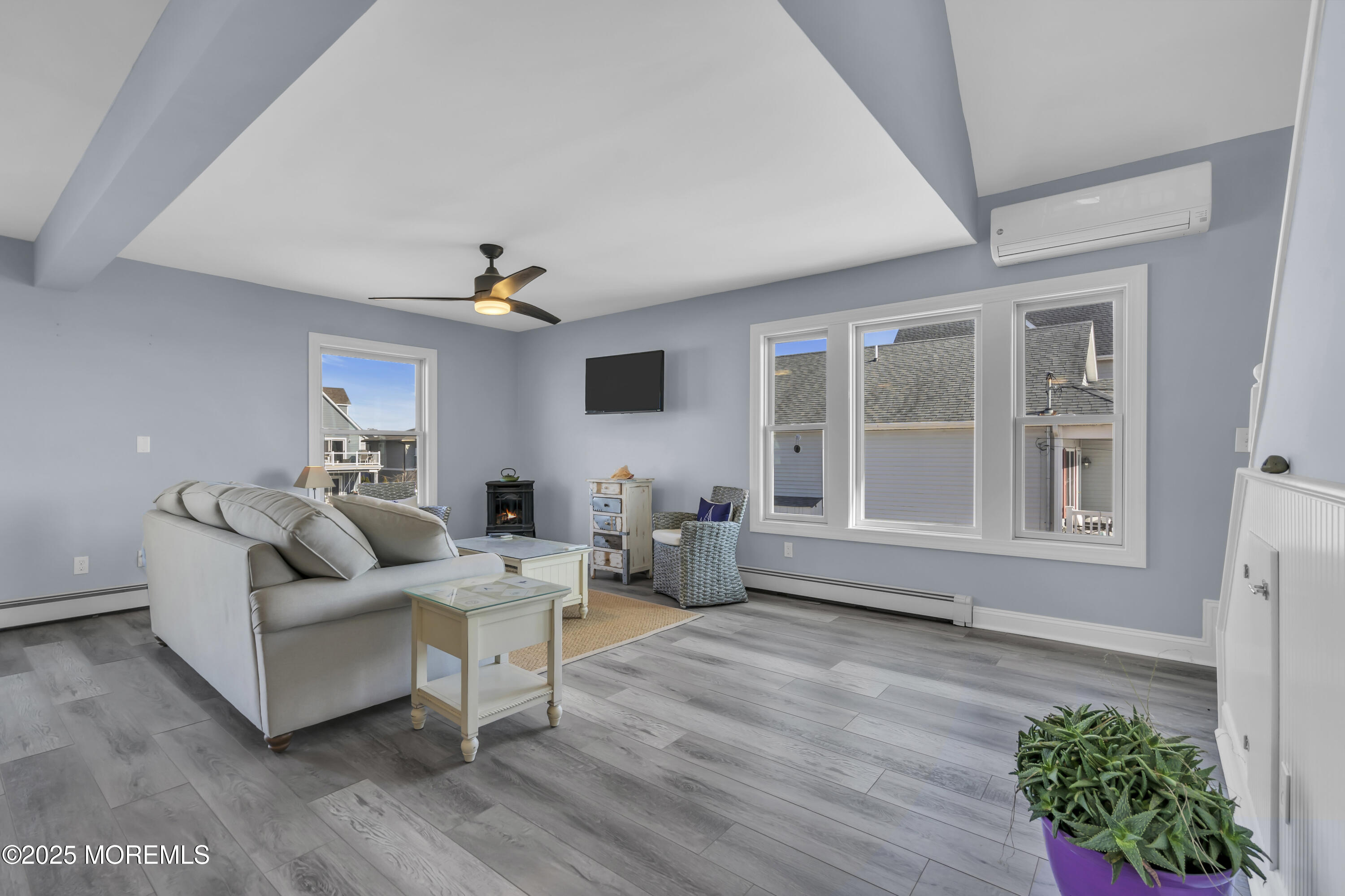 132 St Lawrence Boulevard Brick, NJ 08723 - Photo 14 of 55 a living room with furniture and flowers