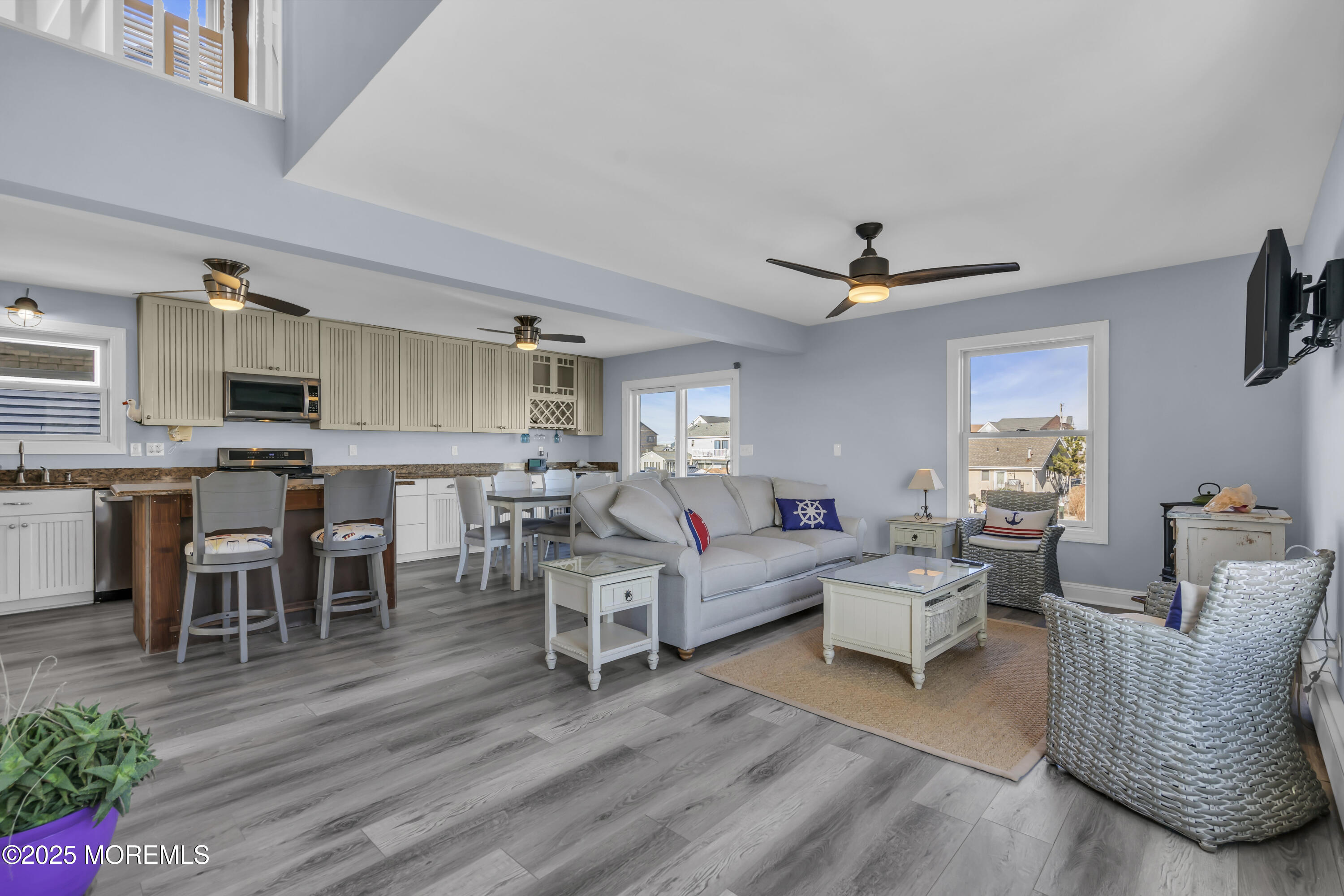 132 St Lawrence Boulevard Brick, NJ 08723 - Photo 15 of 55 a living room with furniture and a wooden floor