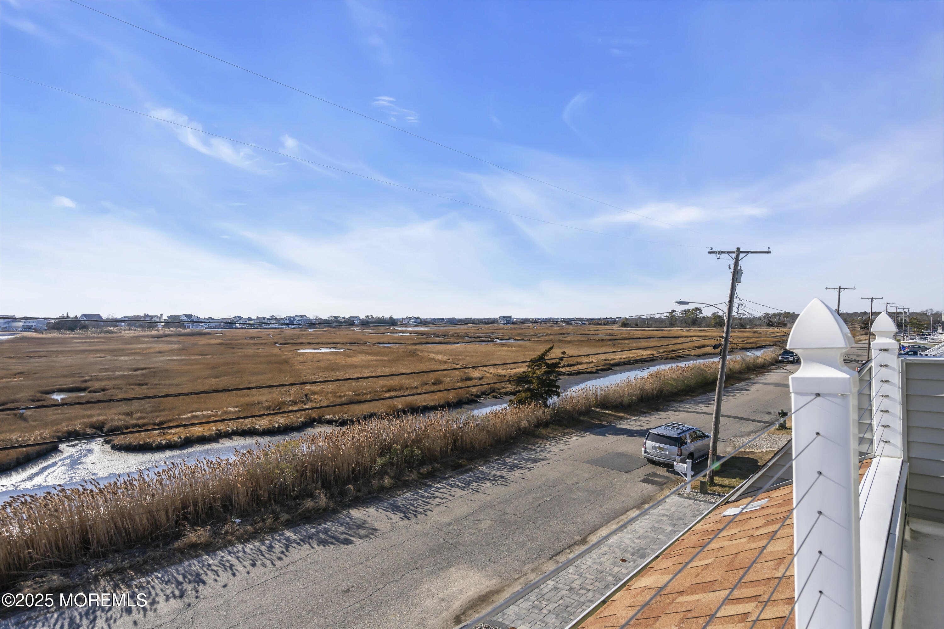 132 St Lawrence Boulevard Brick, NJ 08723 - Photo 40 of 55 a view of a terrace with lawn chairs