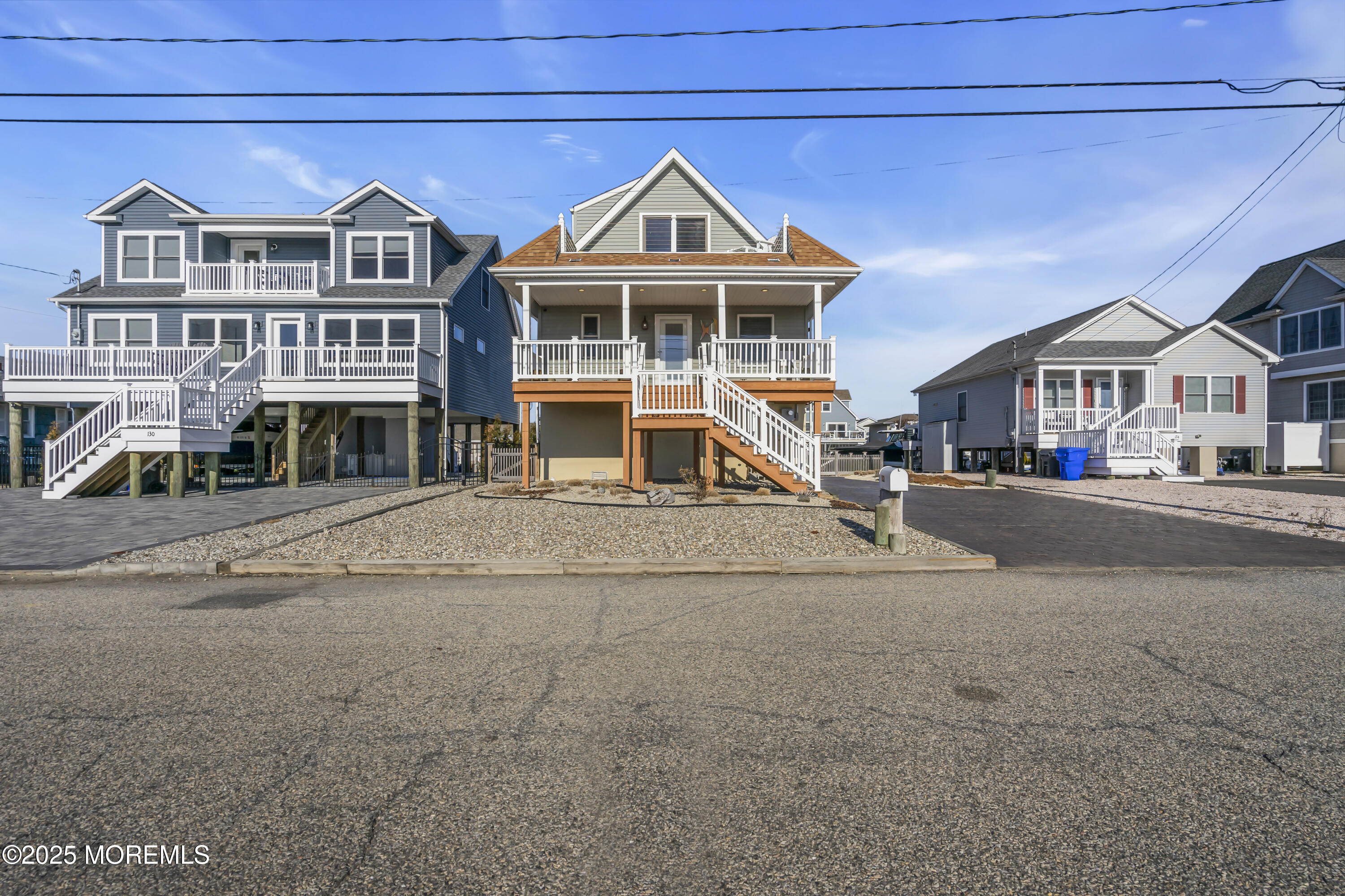 132 St Lawrence Boulevard Brick, NJ 08723 - Photo 4 of 55 a front view of a house with a yard