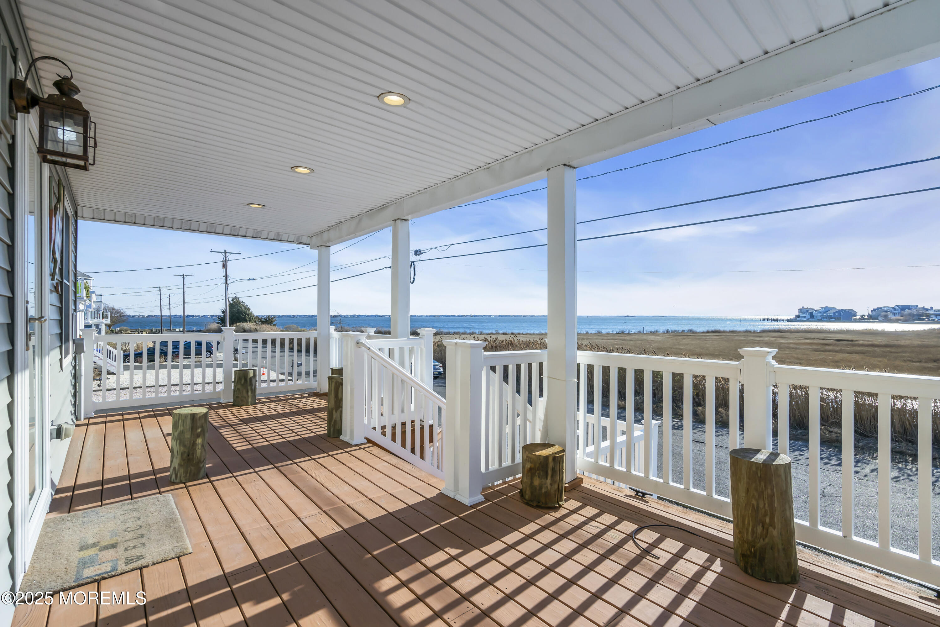 132 St Lawrence Boulevard Brick, NJ 08723 - Photo 42 of 55 a view of a balcony with wooden floor