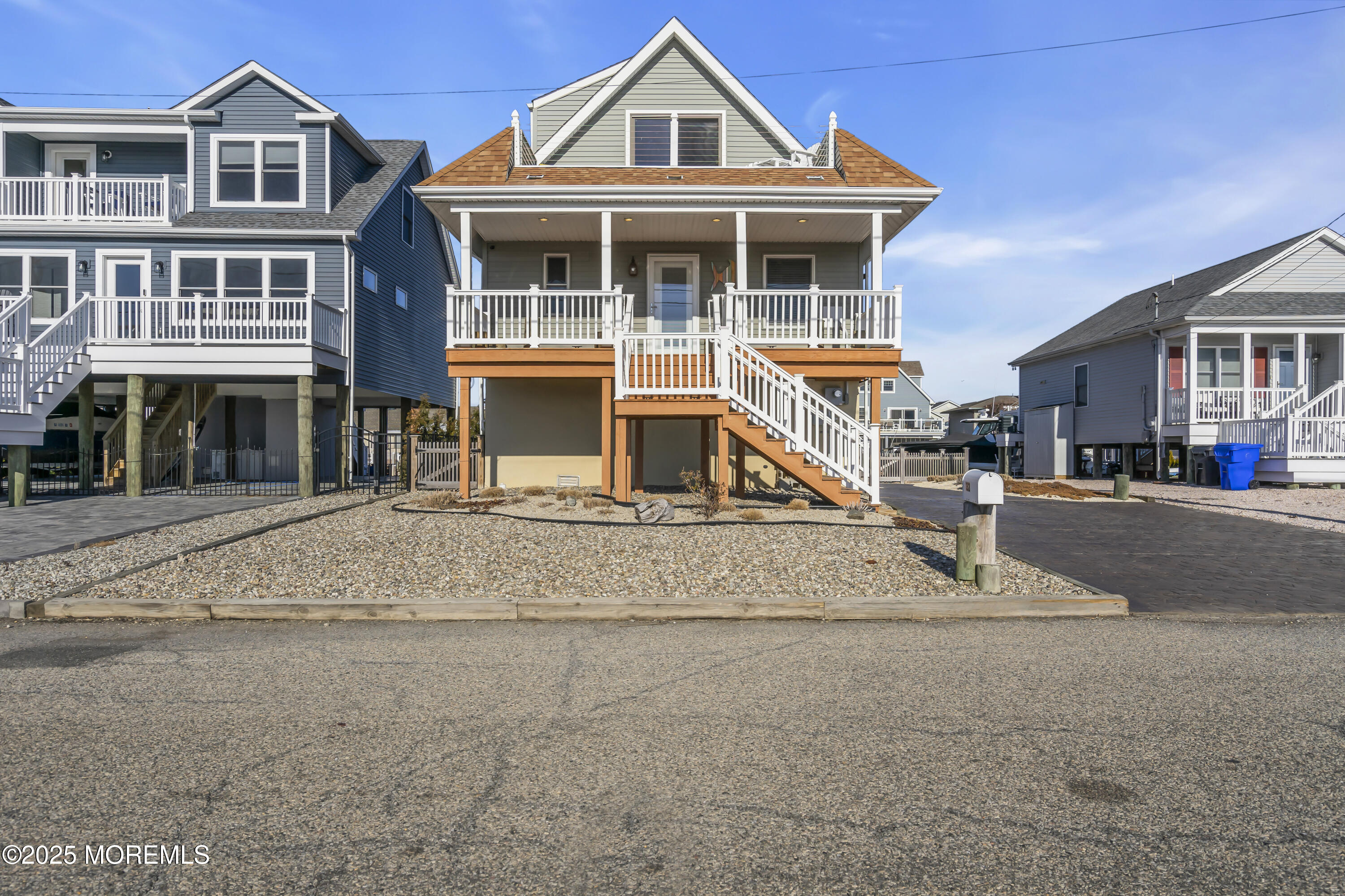 132 St Lawrence Boulevard Brick, NJ 08723 - Photo 5 of 55 a front view of a house with a yard