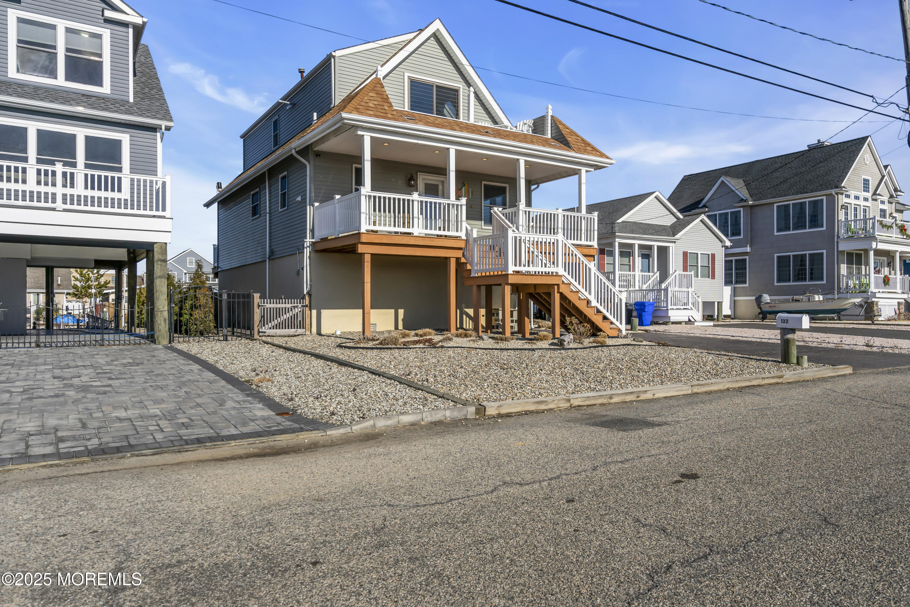 132 St Lawrence Boulevard Brick, NJ 08723 - Photo 6 of 55 a front view of a house with a yard