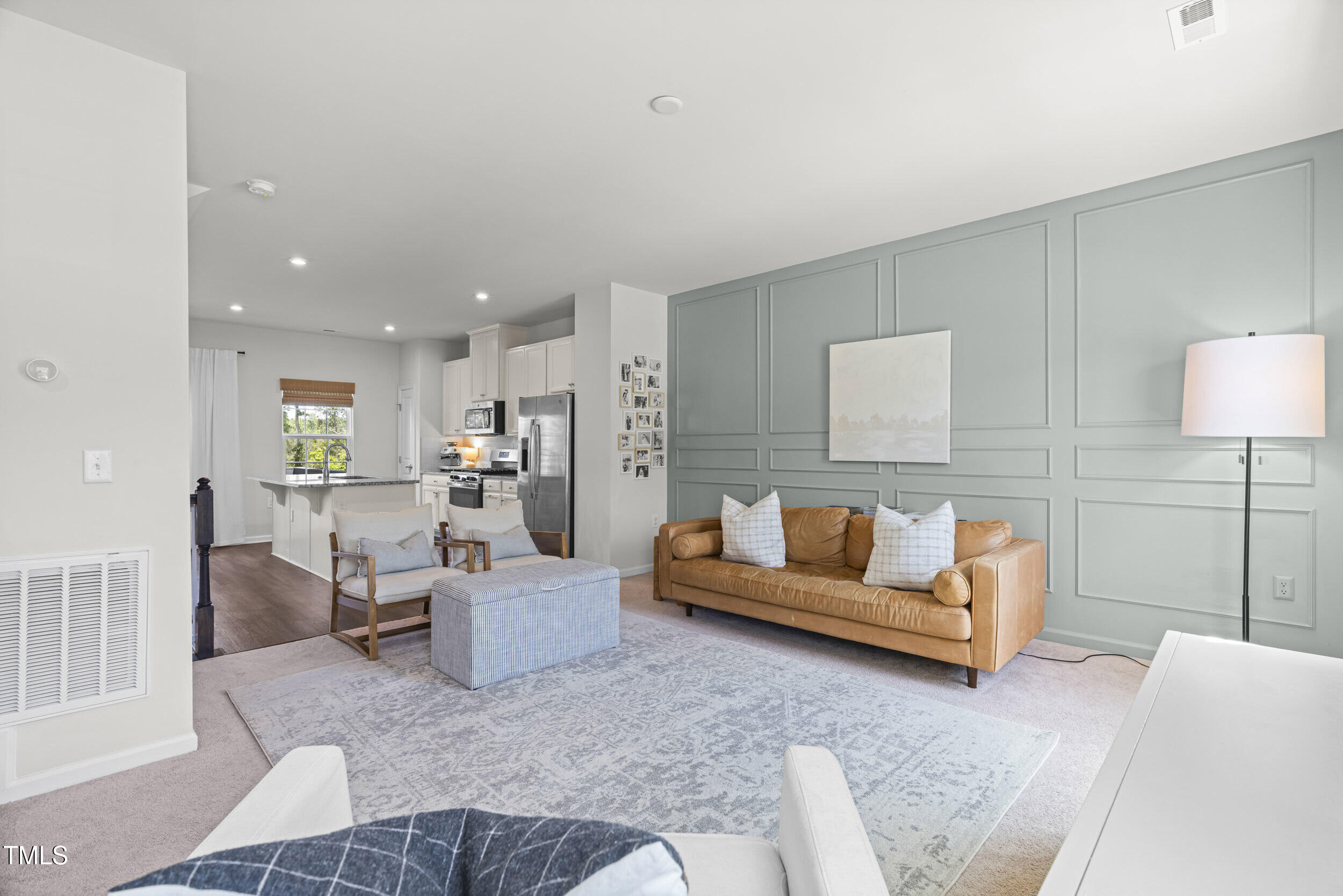 6607 Pathfinder Way Raleigh, NC 27616 - Photo 17 of 38 a living room with furniture and a table