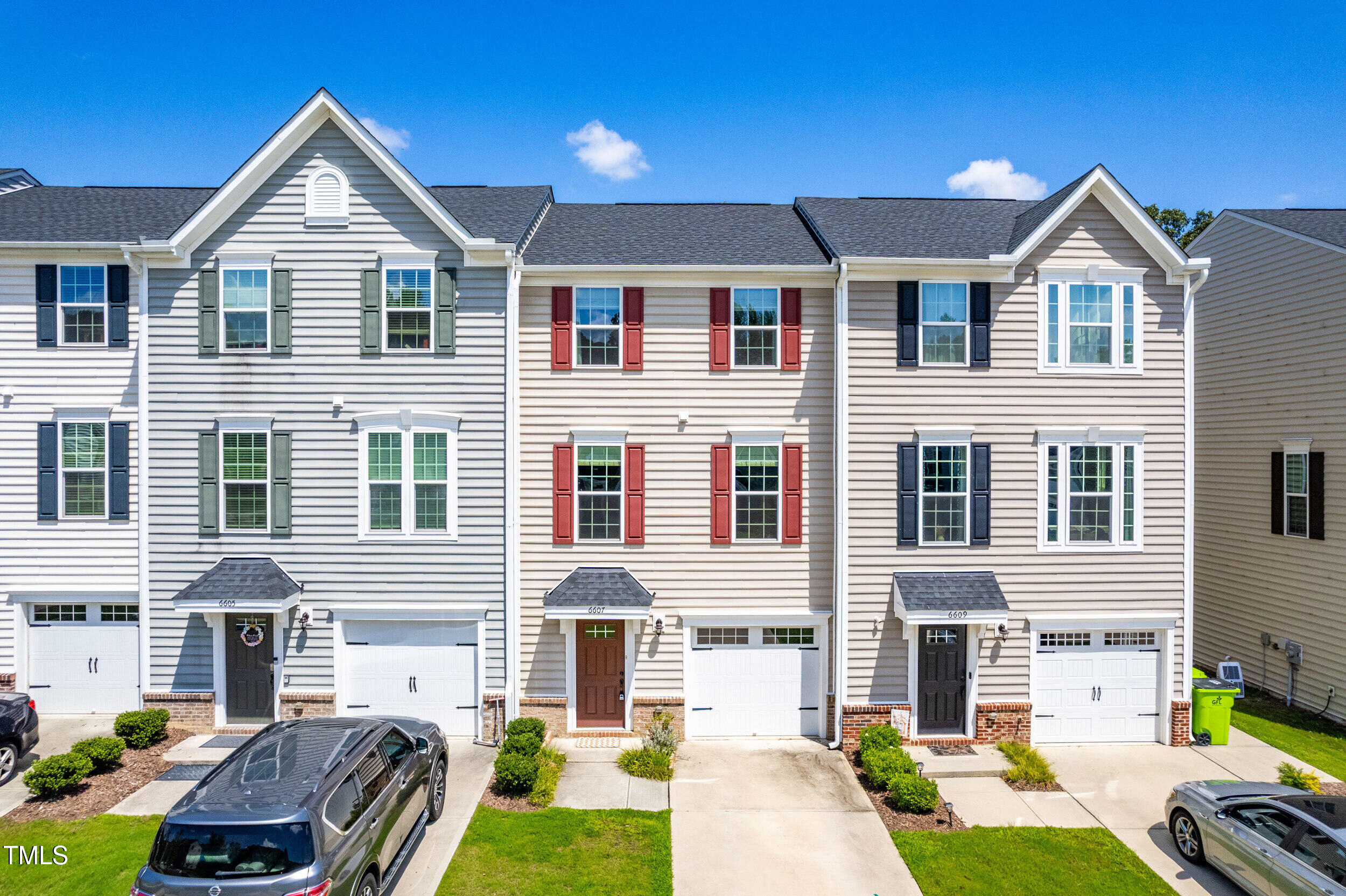 6607 Pathfinder Way Raleigh, NC 27616 - Photo 2 of 38 a front view of a house with a yard
