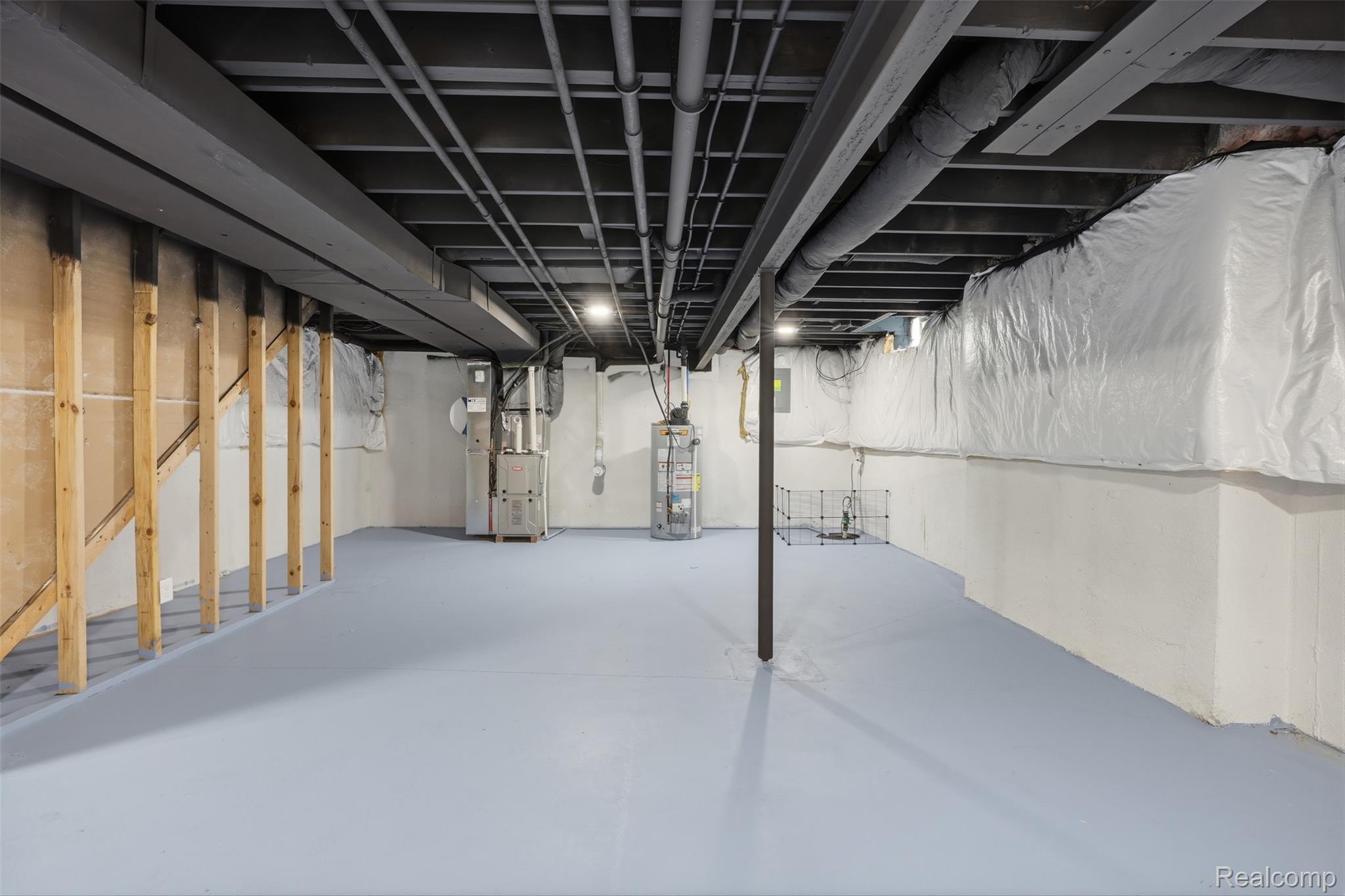 41594 Mitchell Road Novi, MI 48377 - Photo 28 of 35 Unfinished basement with heating unit and water heater