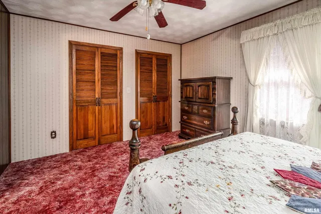 a bathroom with a shower curtain and a sink