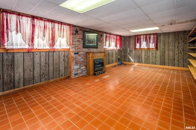 a view of a hallway with a wooden door