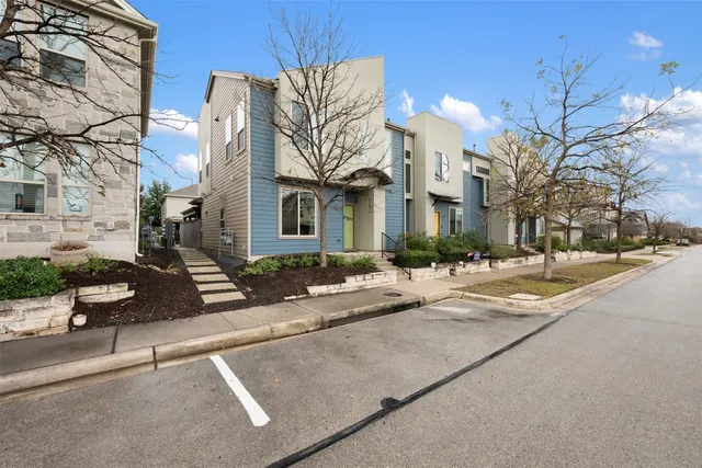 a view of a building with a street