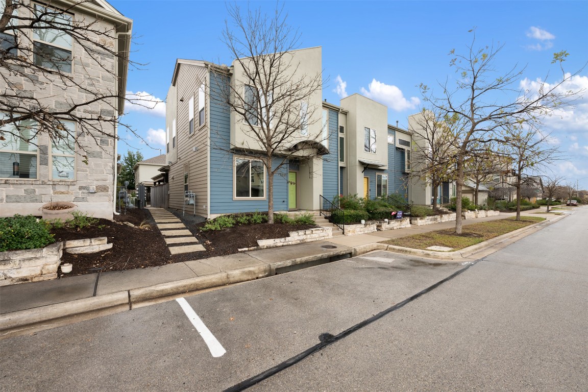 a view of a building with a street