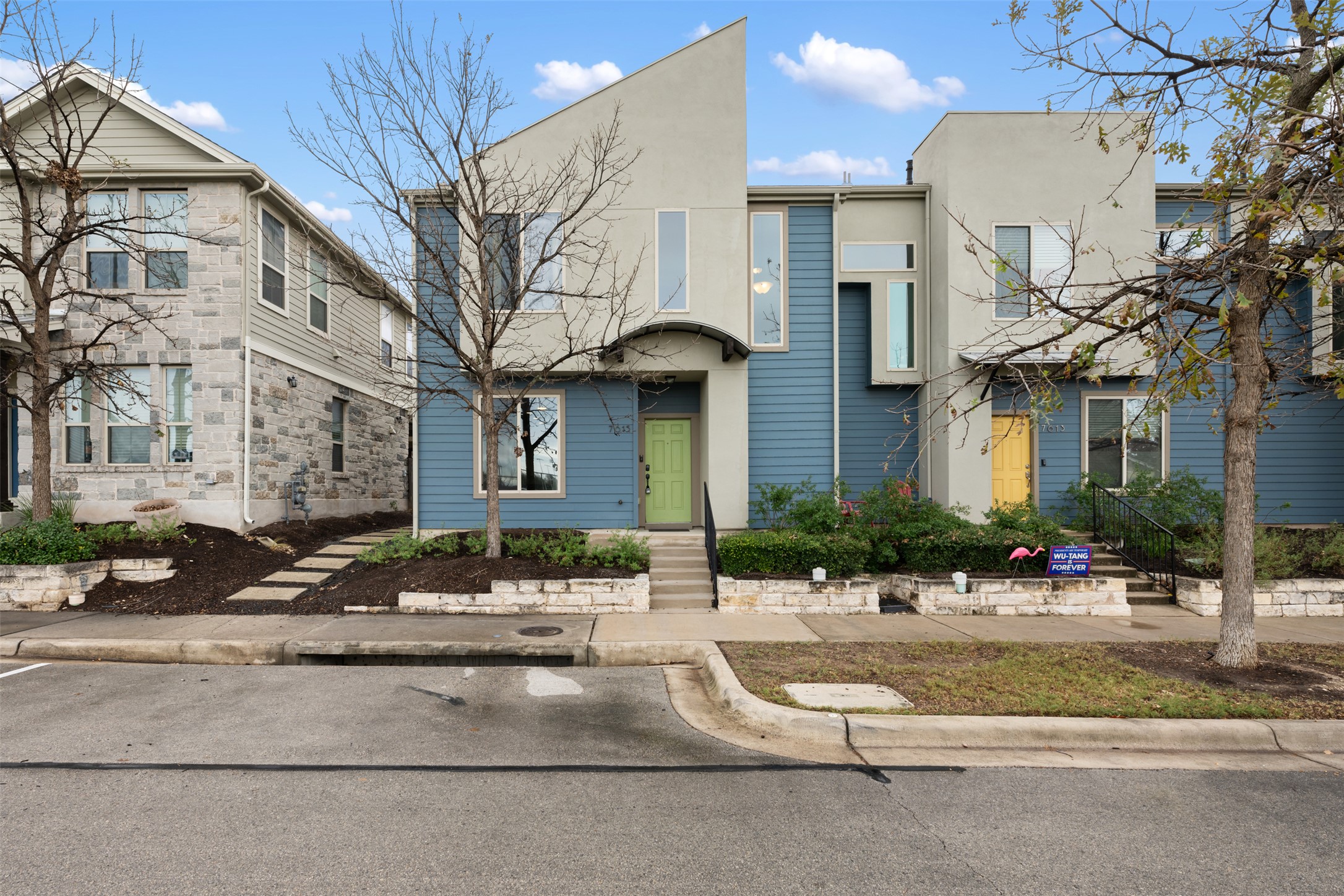 7615 Wolverine Street Austin, TX 78757 - Photo 2 of 40 a view of a building with a street