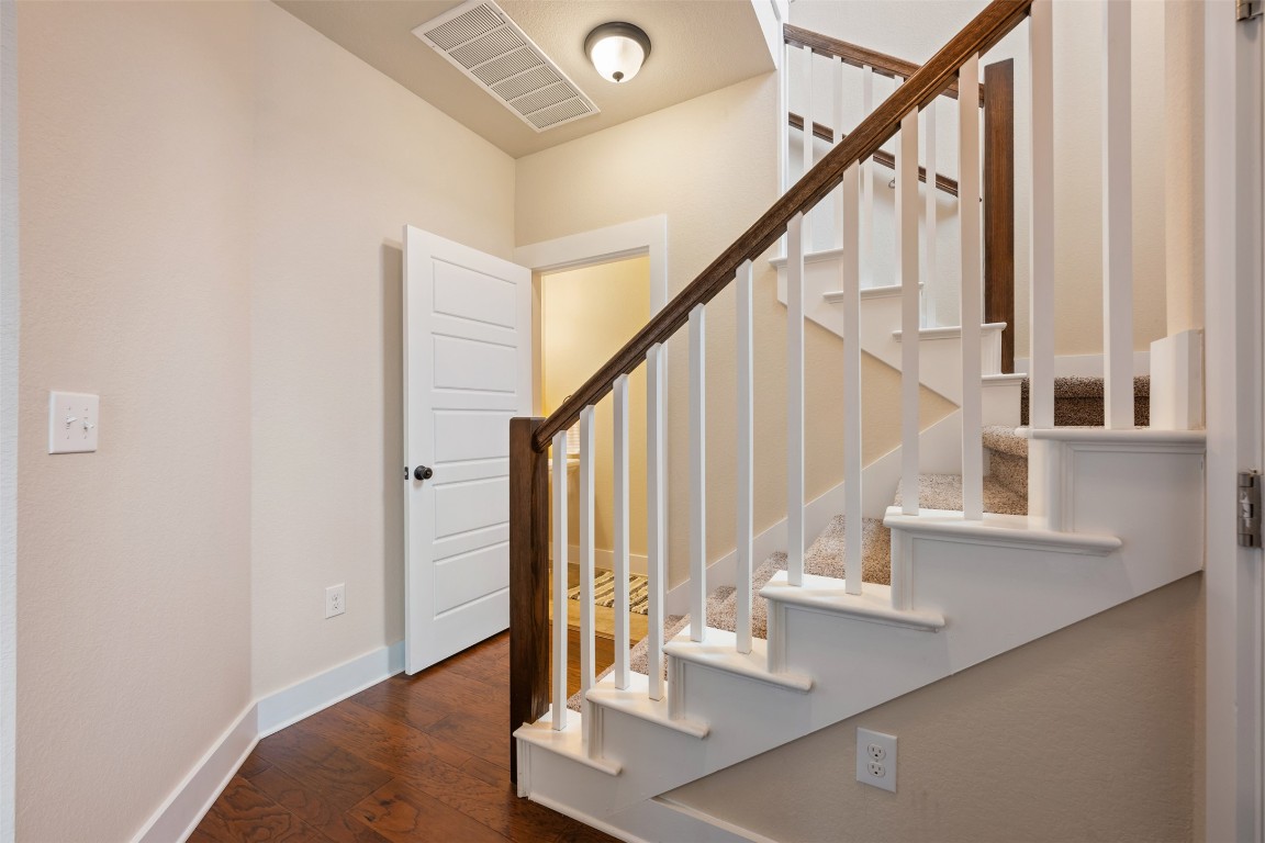 7615 Wolverine Street Austin, TX 78757 - Photo 23 of 40 a view of entryway and hall with wooden floor