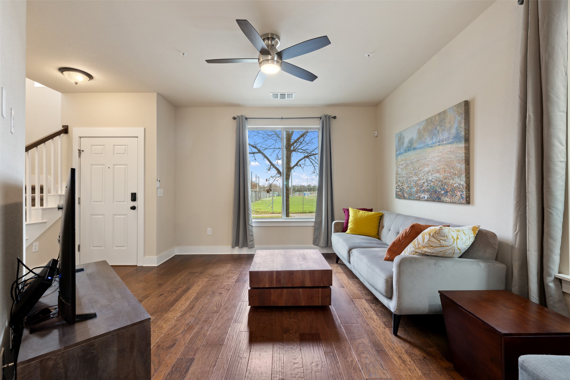 7615 Wolverine Street Austin, TX 78757 - Photo 9 of 40 a living room with furniture and a large window