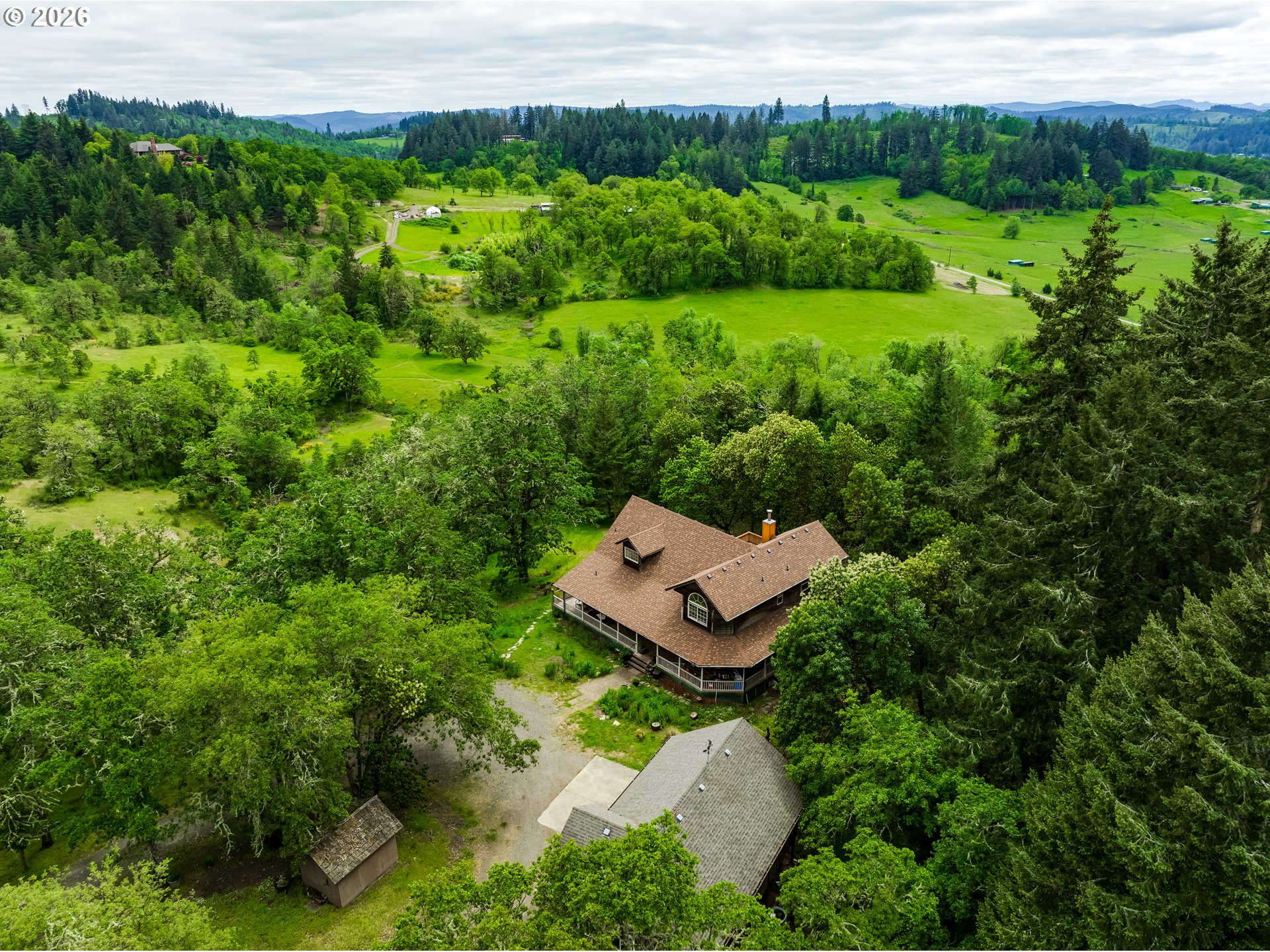 28544 Crow Road Eugene, OR 97402 - Photo 43 of 48 an aerial view of a house with a yard