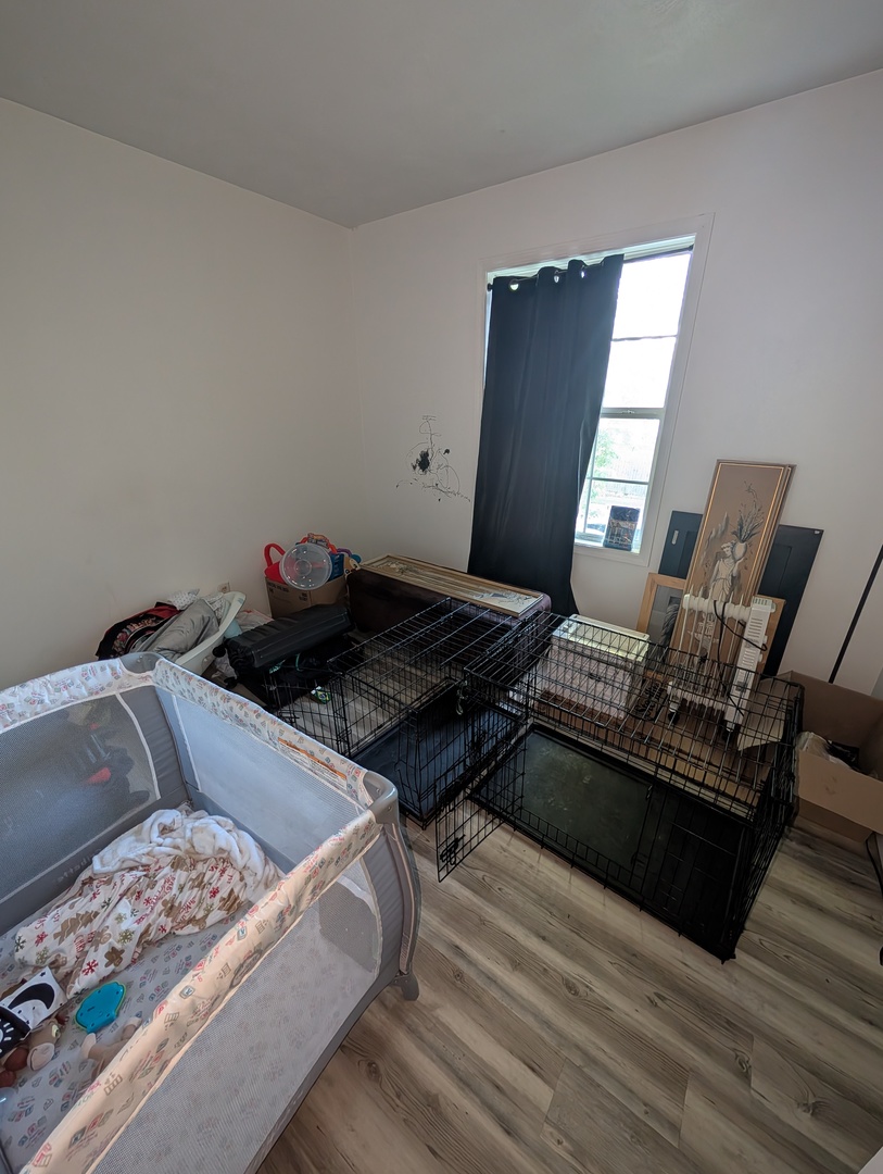 6232-6234 Appomattox Road Davenport, IA 52806 - Photo 20 of 21 a living room with furniture and a rug