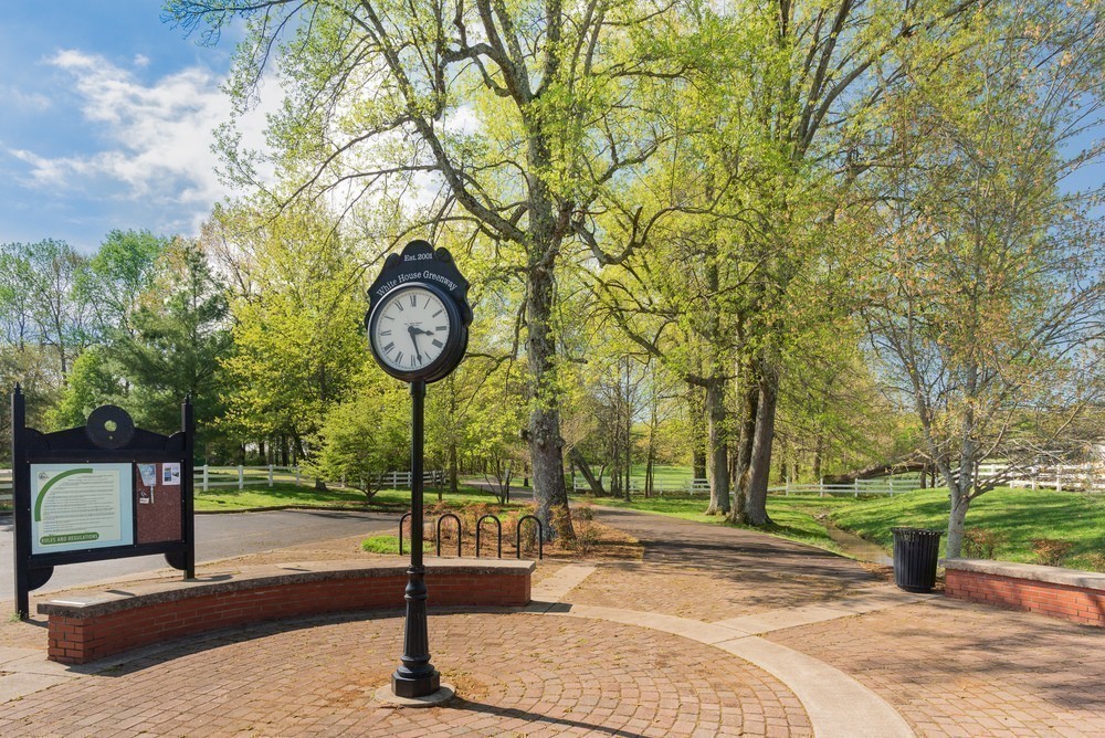 607 Streamview Drive White House, TN 37188 - Photo 11 of 21 a sign board with a fountain and trees