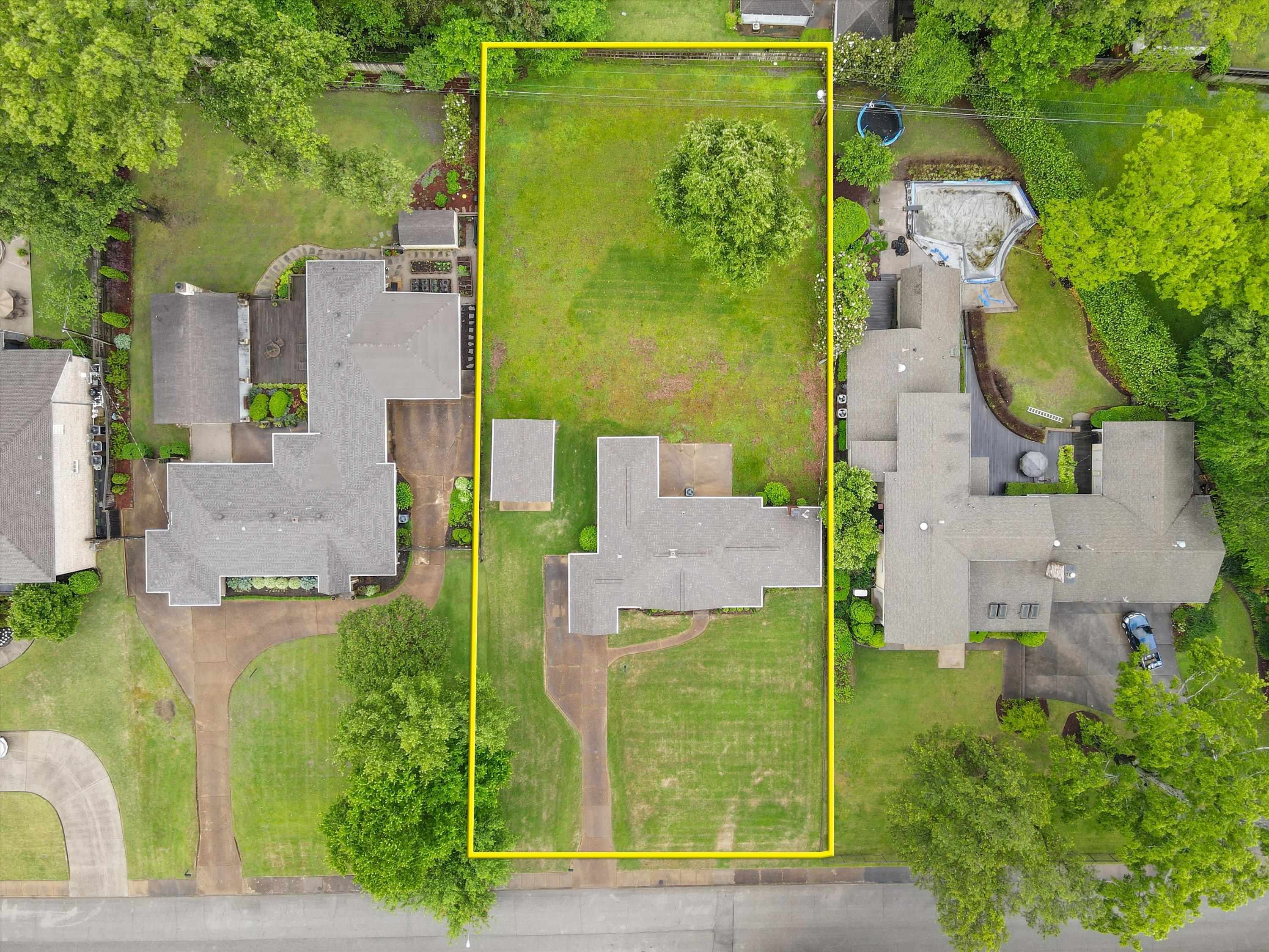 5285 Normandy Road Memphis, TN 38120 - Photo 6 of 7 an aerial view of a house with a garden and plants