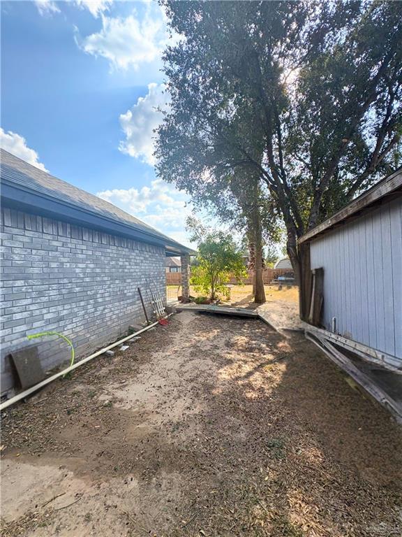 1614 Grovewood Road Mission, TX 78573 - Photo 23 of 25 a view of a backyard of the house