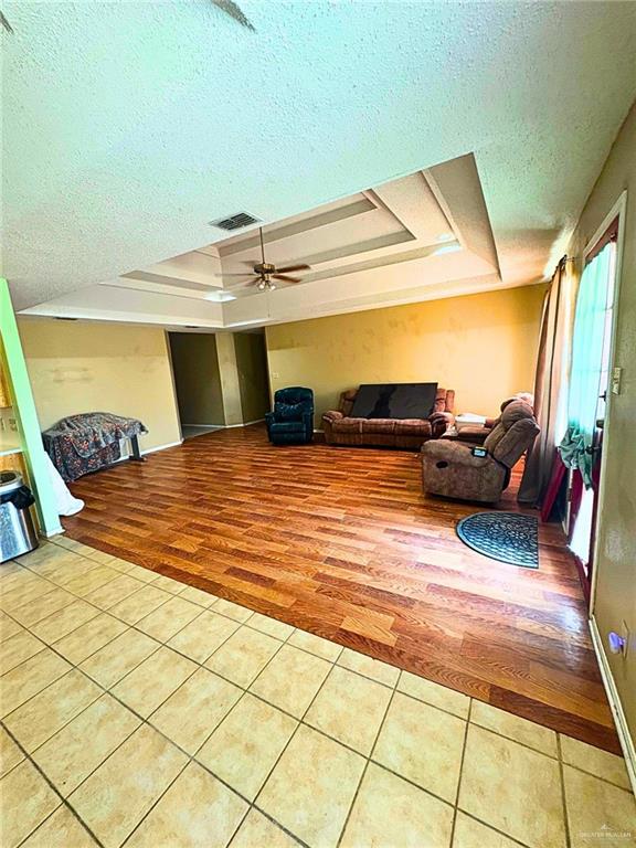 1614 Grovewood Road Mission, TX 78573 - Photo 4 of 25 a bedroom with a bed and wooden floor