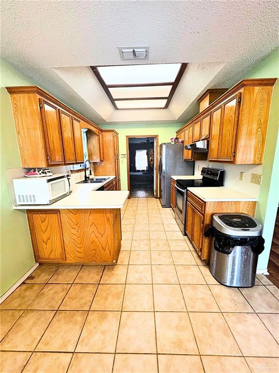 1614 Grovewood Road Mission, TX 78573 - Photo 7 of 25 a large swimming pool with a large window