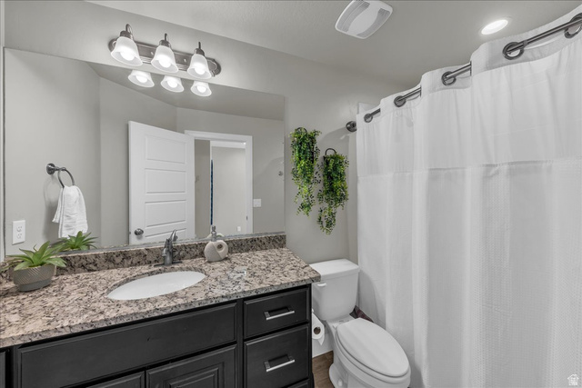 4796 Winged Foot Drive St. George, UT 84770 - Photo 29 of 33 Bathroom with vanity and a shower with curtain