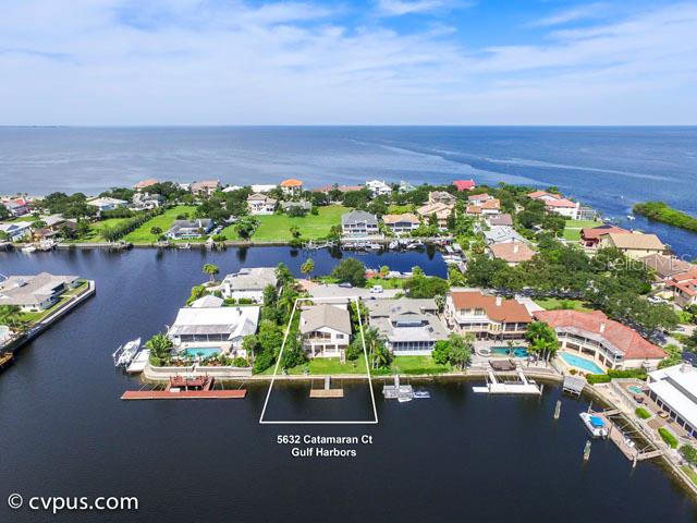 5632 Catamaran Court New Port Richey, FL 34652 - Photo 1 of 1 Expansive water views, and safe mooring just around the corner from the open Gulf