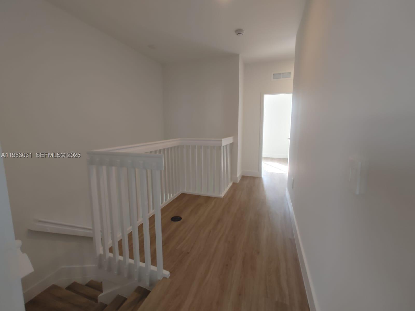 18983 Southwest 345th Terrace Homestead, FL 33034 - Photo 17 of 33 a view of gallery with wooden floor