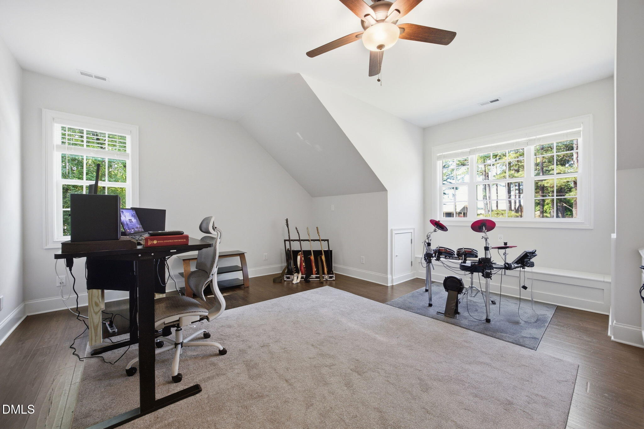 211 Long Street Fuquay-Varina, NC 27526 - Photo 26 of 38 a workspace with chandelier fan and a window