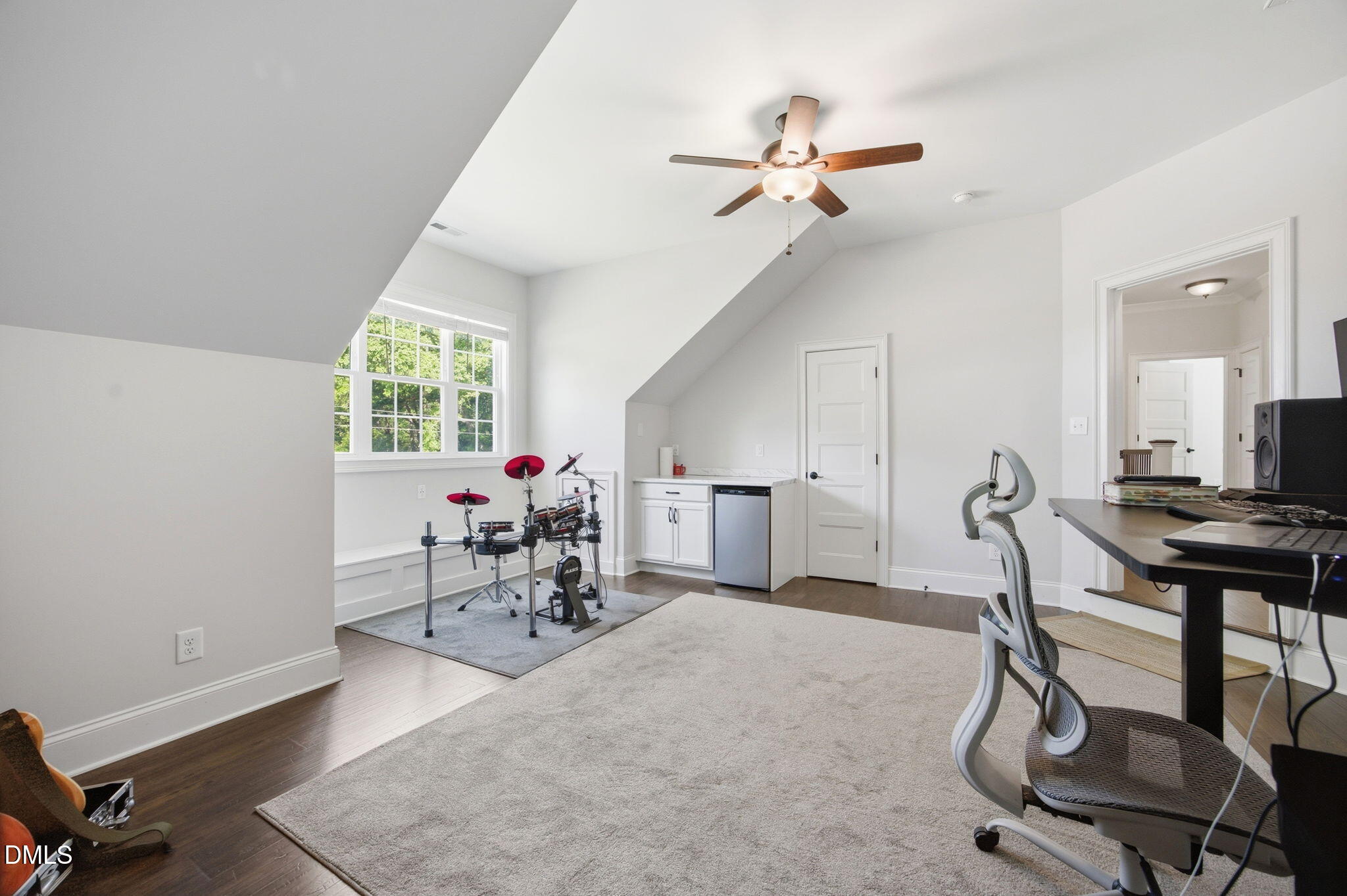 211 Long Street Fuquay-Varina, NC 27526 - Photo 27 of 38 a living room with furniture a air conditioner and a window