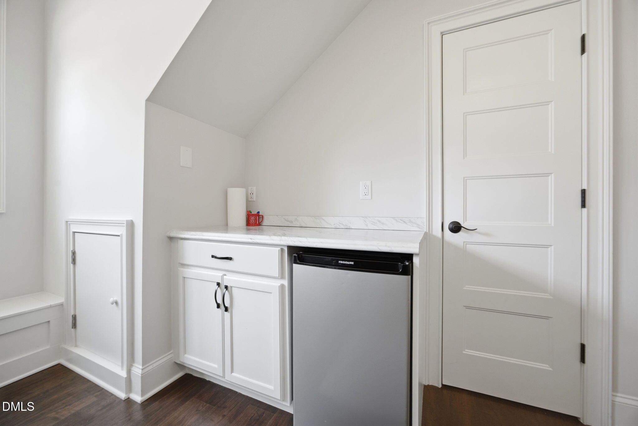 211 Long Street Fuquay-Varina, NC 27526 - Photo 28 of 38 a kitchen with a refrigerator and cabinets