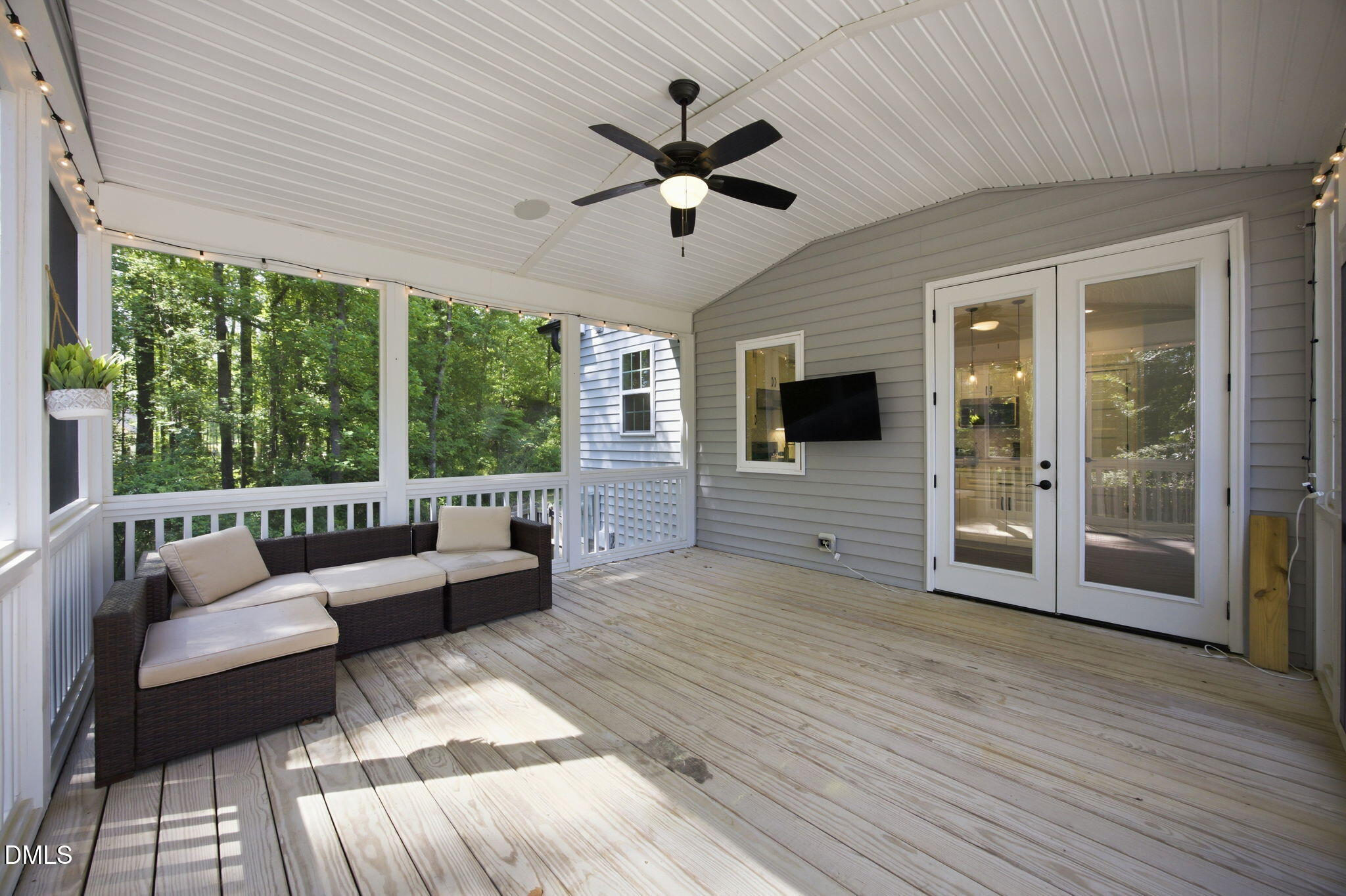 211 Long Street Fuquay-Varina, NC 27526 - Photo 30 of 38 a living room with furniture and a large window