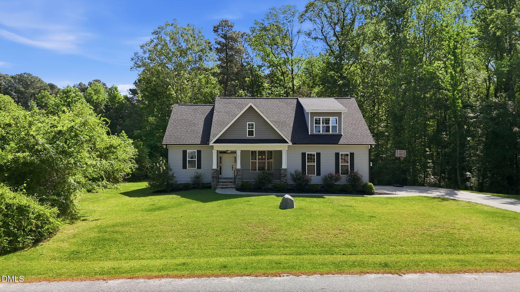 211 Long Street Fuquay-Varina, NC 27526 - Photo 36 of 38 a front view of a house with a yard