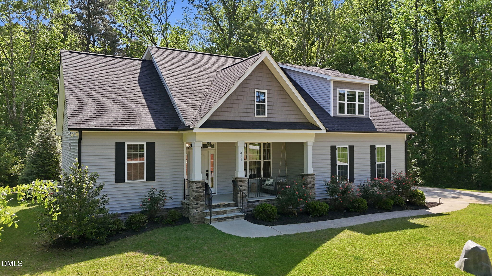 211 Long Street Fuquay-Varina, NC 27526 - Photo 37 of 38 a view of a house with yard and plants