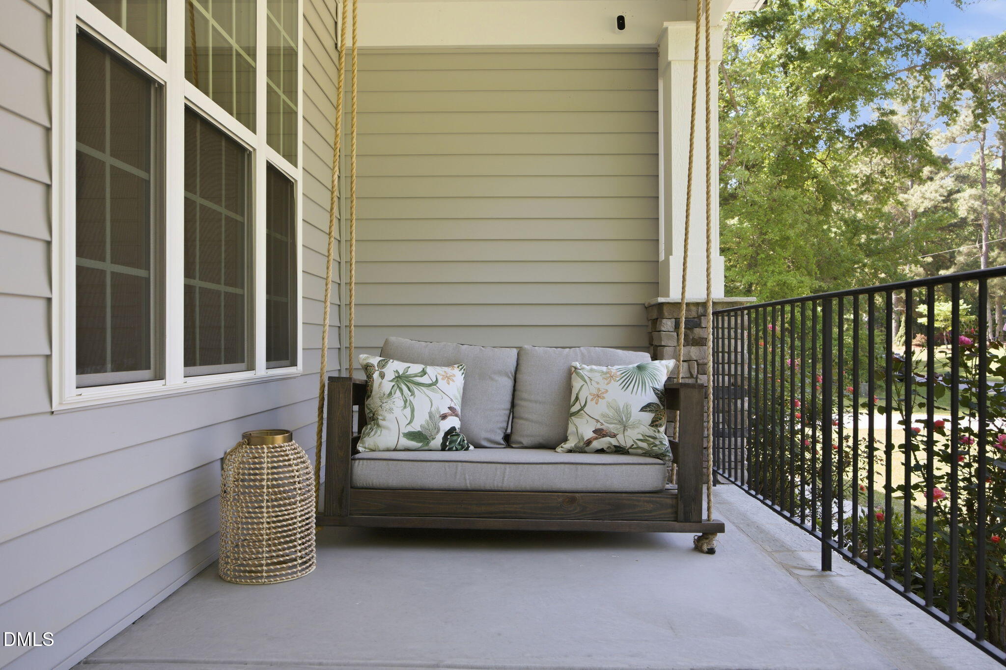 211 Long Street Fuquay-Varina, NC 27526 - Photo 4 of 38 a view of a couch in the balcony