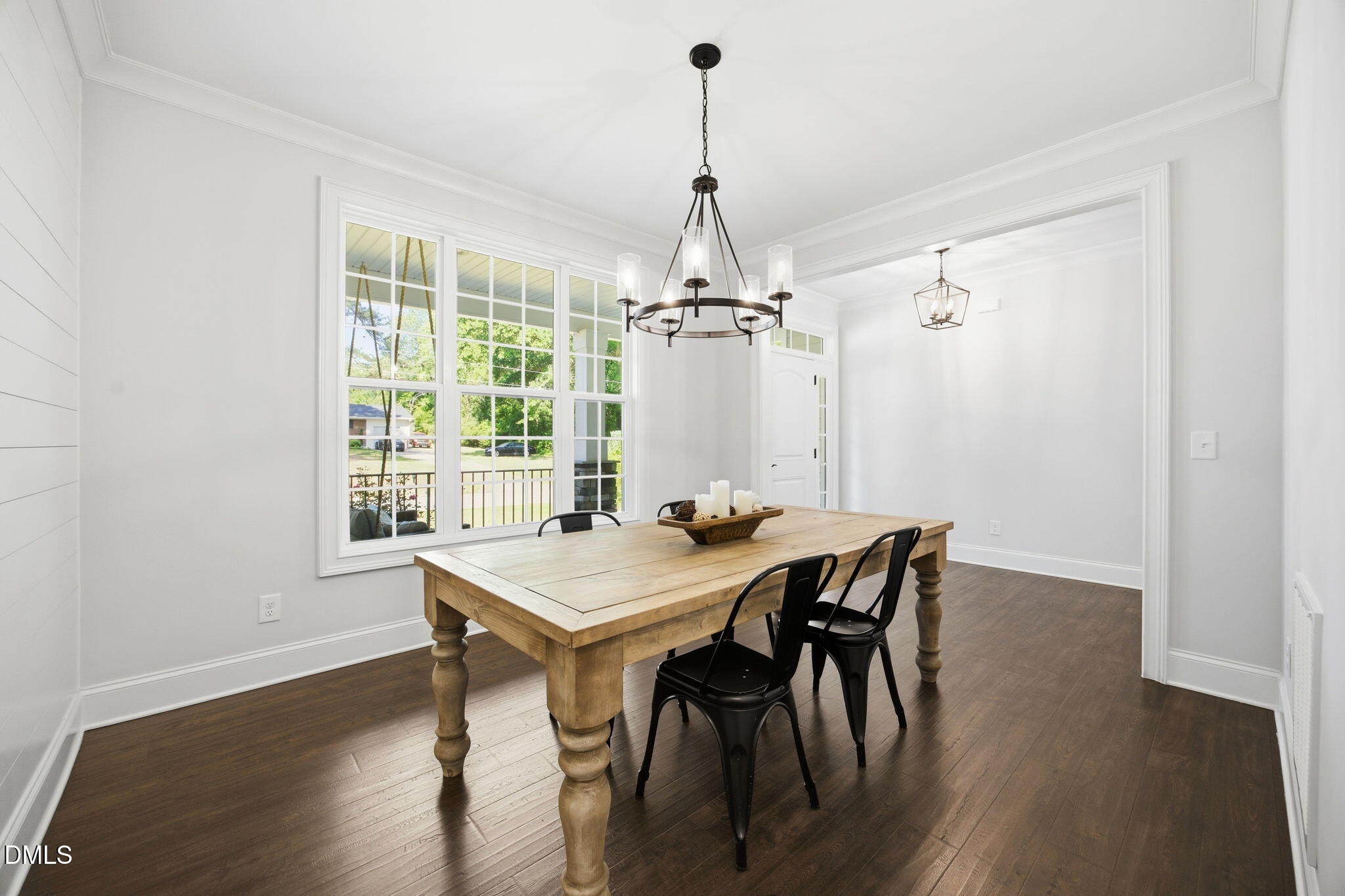 211 Long Street Fuquay-Varina, NC 27526 - Photo 5 of 38 a view of a dining room with furniture window and wooden floor