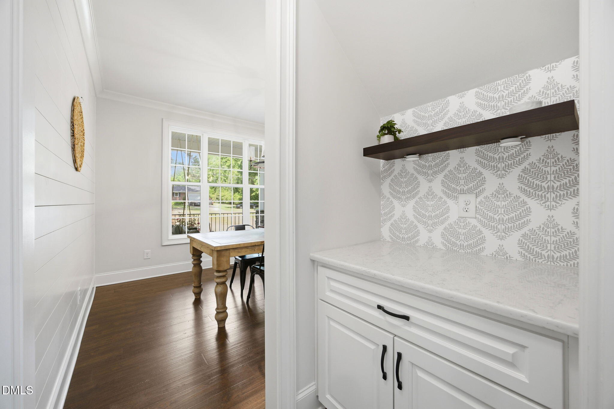 211 Long Street Fuquay-Varina, NC 27526 - Photo 6 of 38 a view of a dining room with furniture and wooden floor